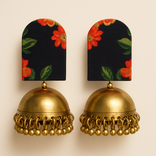 Pair of handcrafted Fabric earrings with red-green floral design pattern on black Fabric and gold accents jhumka.