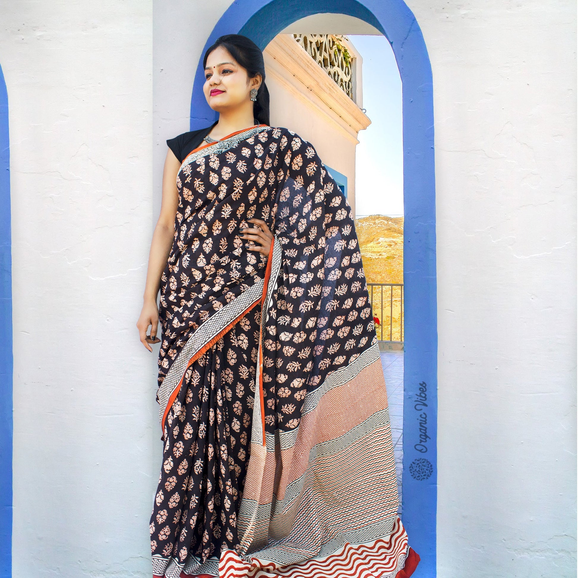 Organic Vibes Black Handblock Printed Mulmul Cotton Saree with Orange White Buties For Women